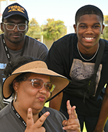 Two Students with a MC Employee at the MC Welcome Event